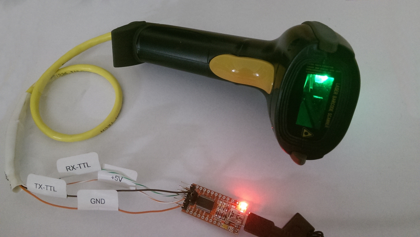 A picture of the MJ-4209 laser Barcode scanner hooked to an FTDI Serial to USB dongle